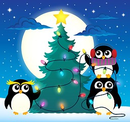 Image showing Penguins around Christmas tree theme 3