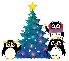 Image showing Penguins around Christmas tree theme 1