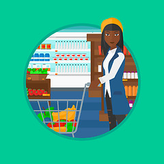 Image showing Customer with shopping trolley at supermarket.