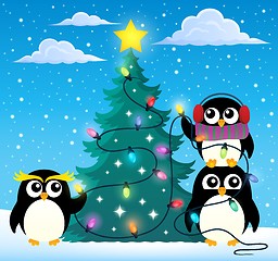 Image showing Penguins around Christmas tree theme 2