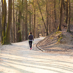 Image showing Woman hiking in nature. 