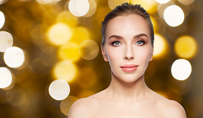 Image showing beautiful young woman face over white background