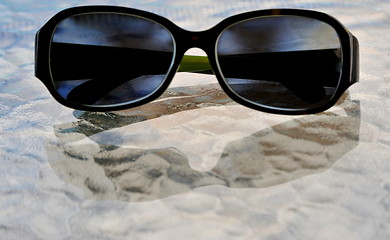 Image showing Sunglasses on vacation.