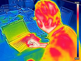 Image showing Infrared thermography image showing the heat emission when man u