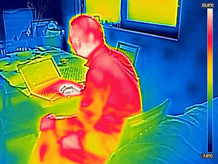Image showing Infrared thermography image showing the heat emission when man u