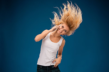 Image showing Portrait of beautiful smiling girl with modern l phone