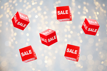 Image showing boxes with sale signs over holidays lights