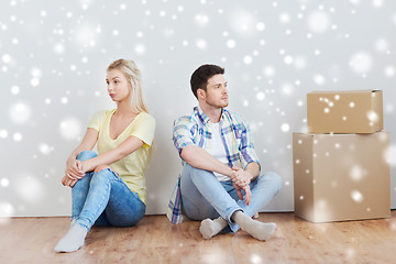 Image showing unhappy couple having argument at home