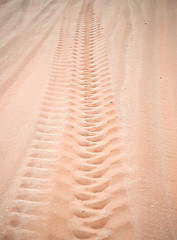 Image showing wheel track on sand