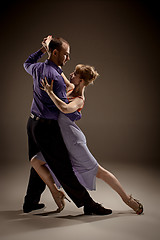 Image showing The man and the woman dancing argentinian tango