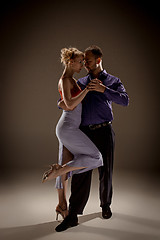 Image showing The man and the woman dancing argentinian tango