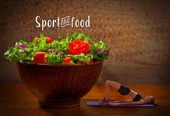 Image showing Fresh salade on wooden background