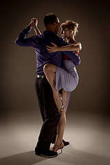 Image showing The man and the woman dancing argentinian tango