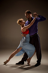 Image showing The man and the woman dancing argentinian tango