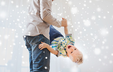 Image showing father with son playing and having fun at home