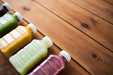 Image showing bottles with different fruit or vegetable juices