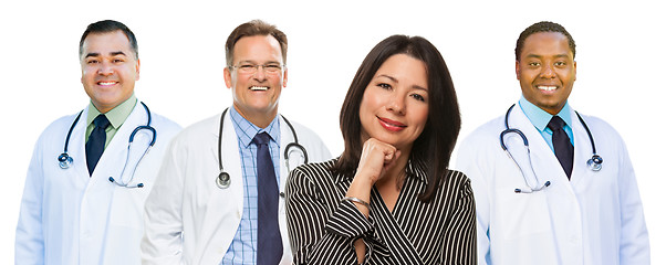 Image showing Three Mixed Race Doctors Behind Hispanic Woman on White