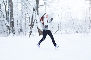 Image showing Young girl on morning jog