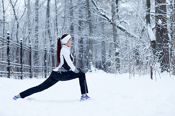 Image showing Sports woman on stretching exercises