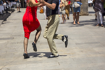 Image showing Street dancers performing tango in the street among the people