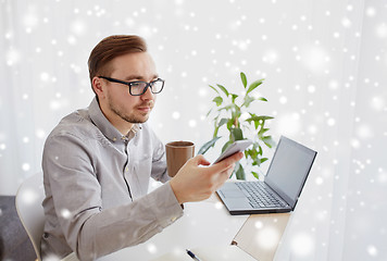 Image showing businessman with smarphone and coffee