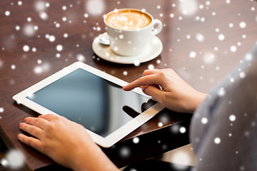 Image showing woman with tablet pc and coffee cup