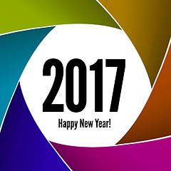 Image showing Happy New Year 2017 on a background of the camera lens