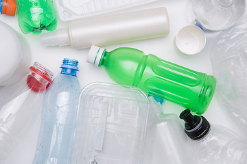 Image showing PET bottles on empty table