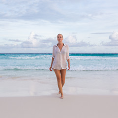 Image showing Woman on summer vacations at tropical beach of Mahe Island, Seychelles.