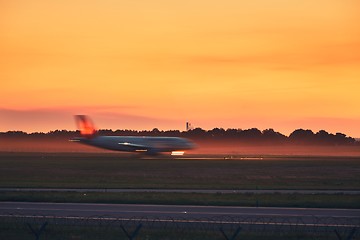 Image showing Airplane taxiing to the runway