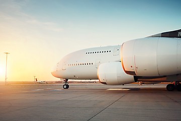 Image showing Huge airplane at the sunset