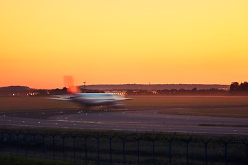 Image showing Airplane taxiing to the runway