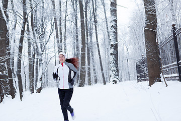 Image showing Winter landscape with young woman