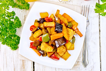 Image showing Roast with vegetables and honey in plate on board top