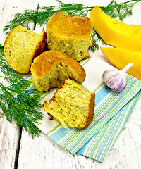 Image showing Scones pumpkin with garlic and dill on napkin