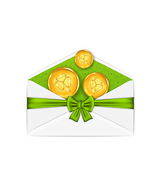 Image showing Open white envelope with golden coins and bow ribbon for St. Pat