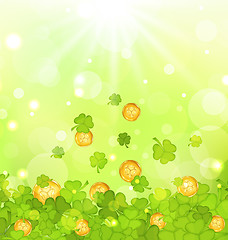 Image showing Light background with clovers and coins for St. Patrick\'s Day