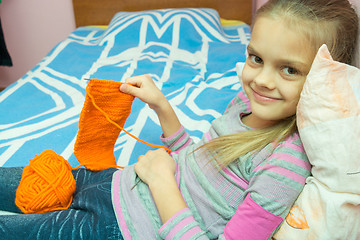 Image showing Girl smiling showing associated scarf