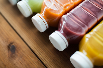 Image showing bottles with different fruit or vegetable juices