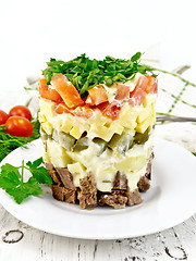 Image showing Salad with beef and tomato on board
