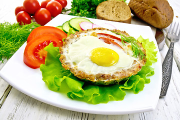 Image showing Tartlet meat with egg on light board