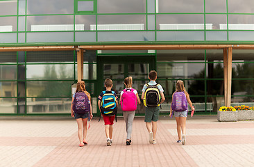 Image showing group of happy elementary school students walking