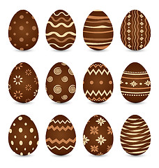 Image showing Easter set chocolate ornate eggs with shadows isolated on white 