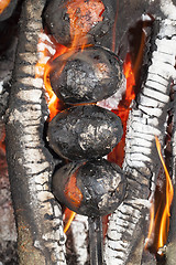 Image showing fried vegetables on a fire