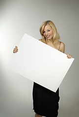 Image showing woman with empty poster