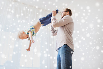 Image showing father with son playing and having fun at home