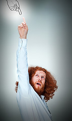 Image showing Portrait of young man with shocked facial expression