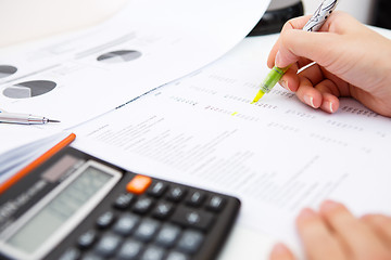 Image showing Desk woman with accounting records