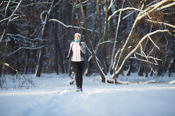 Image showing Young sportswoman on morning jog