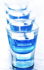 Image showing blue alcoholic drink into small glasses